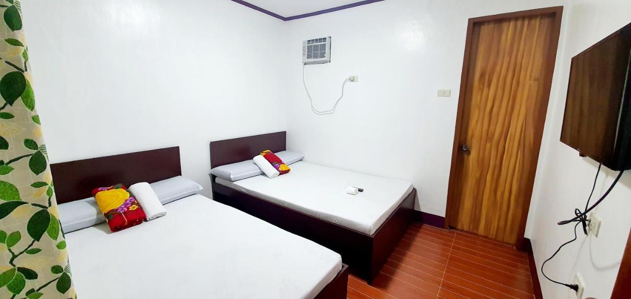Sj Pabua Travellers Inn Mambajao Kültér fotó